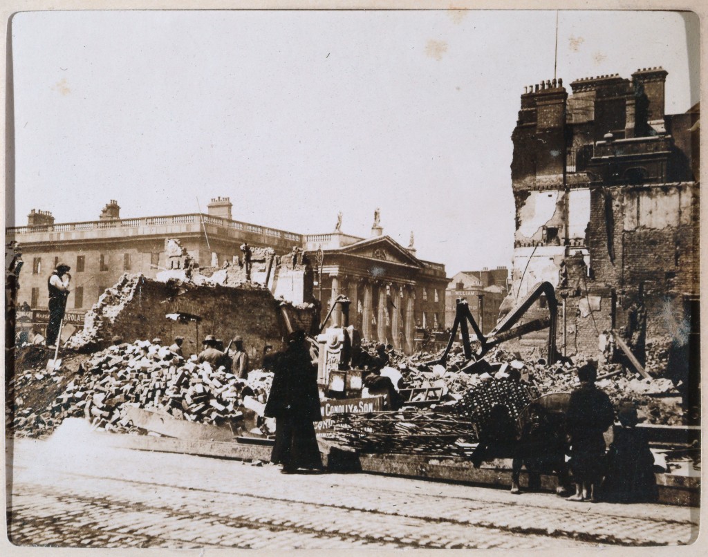 Rubble with GPO in background, May 1916. By permission of the Royal Irish Academy. © RIA